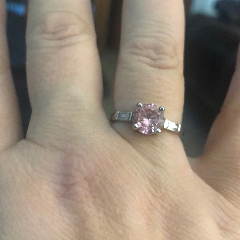 Sterling Silver Ring with pink lab created stone. Size 9